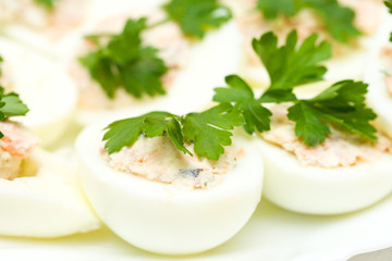 eggs stuffed with red fish on plate