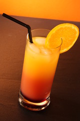 Tequila Sunrise On Black Surface (golden light)