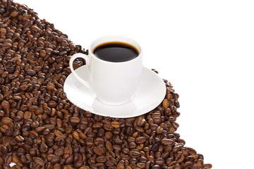 cup with coffee and beans