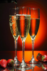 Champagne poured in to the glass