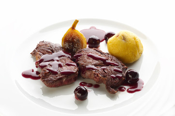Deer steak with cranberries sauce