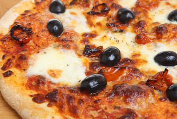 Pizza with Mozzarella, Tomatoes and Olives
