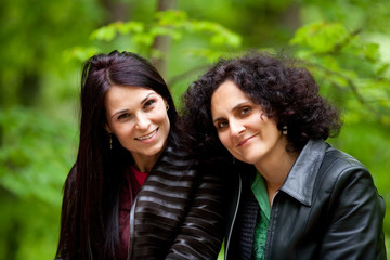 Fototapeta premium Cheerful girlfriends outdoor