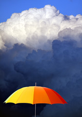 The Umbrella against stormy sky.