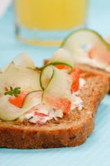 Toast with vegetables and fish