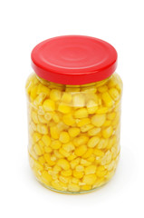 Sweet corn in glass jar isolated on white