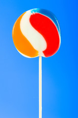 Colourful lollipop against the colourful background