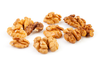 pieces of walnut over white background