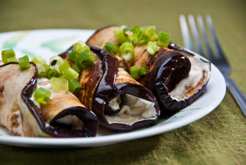 Eggplant rools with goat cheese and young onion
