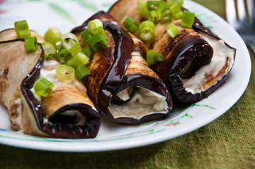 Eggplant rools with goat cheese and young onion