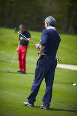 Golfer pointing and measuring the swing. - 22813975