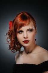 Fototapeta premium Portrait of an attractive redhead woman