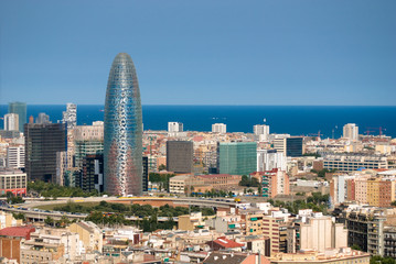 Overlooking the city of Barcelona in front of the Agbar Tower