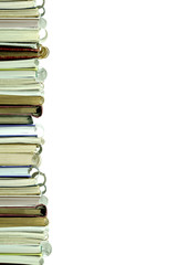 A pile of notebooks isolated on white background
