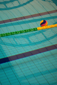 Water polo game ball in a swimming pool