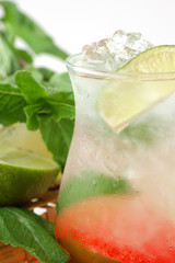 cocktail with a lime and mint