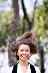 Hair up, Closeup portrait of a happy young woman