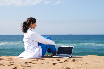 doctor relaxing on beach