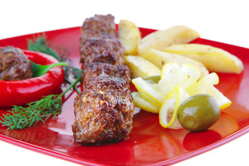 beef meatballs on red plate