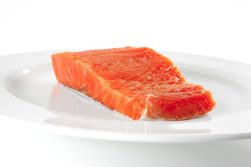 pink salmon on white plate