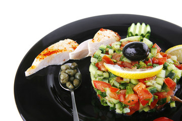 grille chicken meat chunks served black