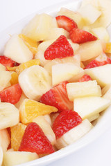 Fresh fruit salad on a white plate
