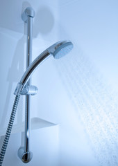 Shower with running water (color toned image)..