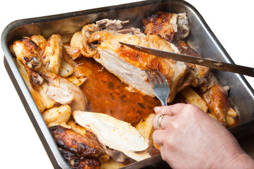 homemade roasted chicken with potatoes isolated