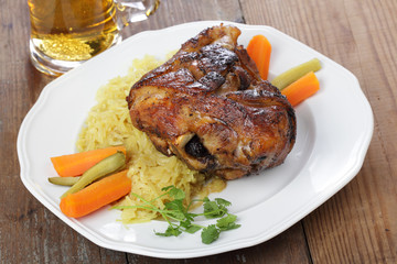 Eisbein, roasted pork knuckle with sauerkraut and beer