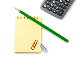 Notebook, pencil and calculator on white background