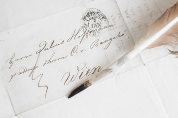 ancient letter with feather