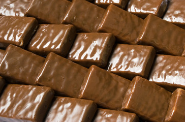 background of chocolates, packed in a ladder