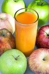 Apples and juice in glass