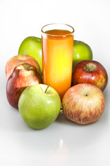 Apples and juice in glass
