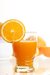 glass full of fresh orange juice