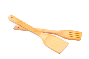 Wooden cooking utensils on white