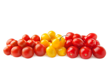 A set of cherry tomatoes. Different colors. Isolated on white.