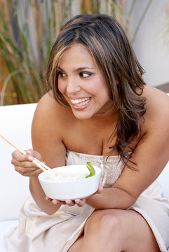 Beautiful Woman Eating Rice