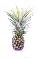 Ripe pineapple on a white background