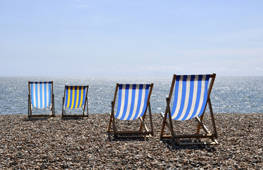 Deck chairs on Brighton beach