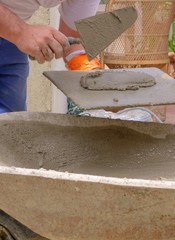 Plastering a wall outside