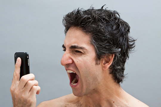 Man shouting on his cell phone