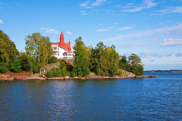 Fototapeta na wymiar Cottage on island in Scandinavia