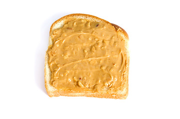 chunky peanut butter sandwich on white