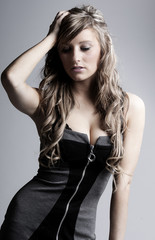 Fototapeta premium Pretty Teenager with Hand on Head