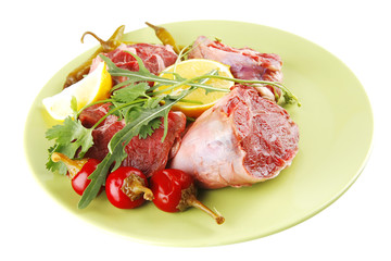 raw beef medallion on green