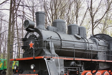 Locomotive monument in the museum of military equipment