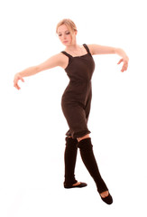 Young woman makes dancing exercise isolated on white
