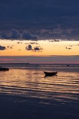 boat at the sea, sunrise