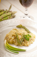 asparagus rice over dish and red wine